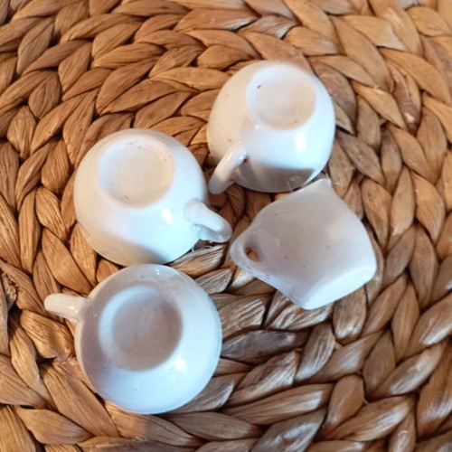Mini vintage ceramic set used, three cups and milk jug