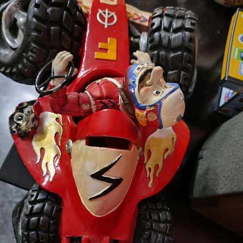 Cartoon piggy bank Formula 1 used