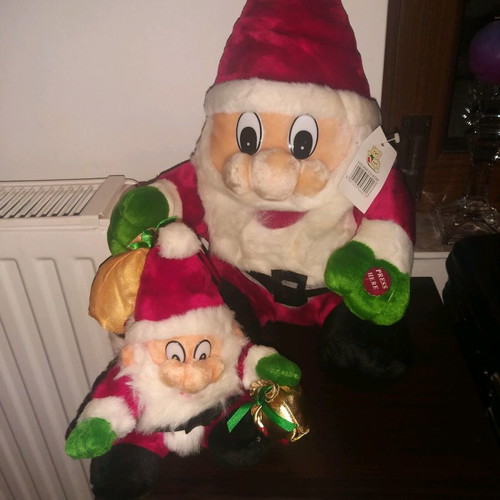 Santa Claus singing carols, new, pack of two sizes