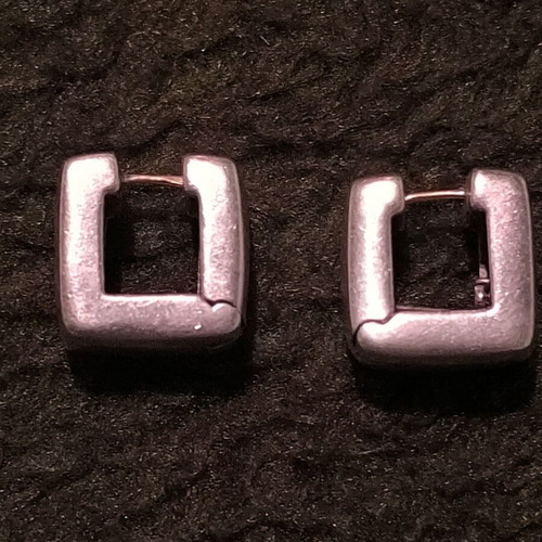 Silver earrings used with geometric shape and hinged clasp