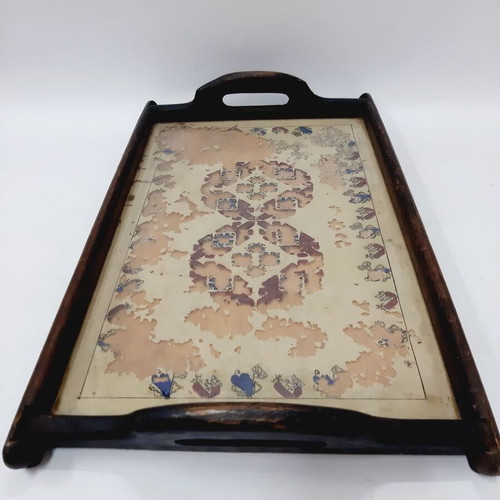 Vintage wooden tray with glass panel and painted design used
