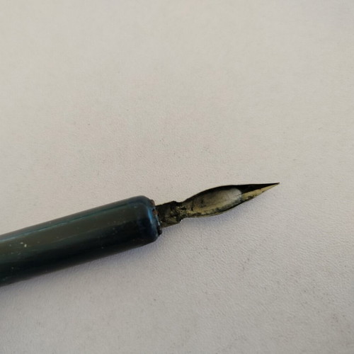 Old dip pen used with metal and wood wear