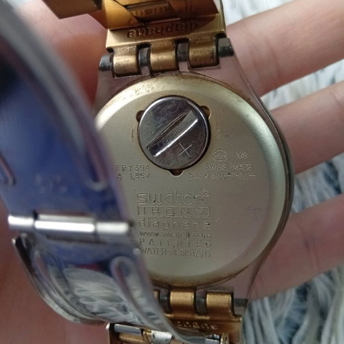 Swatch women's watch used, gold with dial imperfection