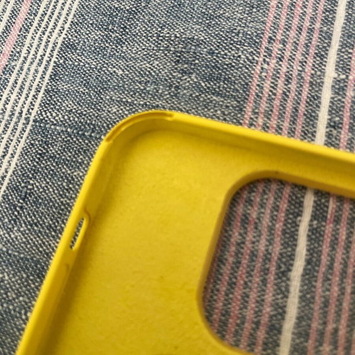 iPhone 14 Pro genuine case used with minor wear and blue case included