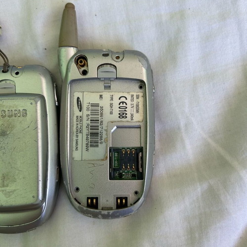 Samsung T100 phone set used, one works, one for parts
