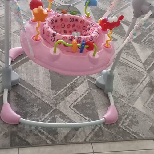 Jumberoo Moni like new with rotating seat and music