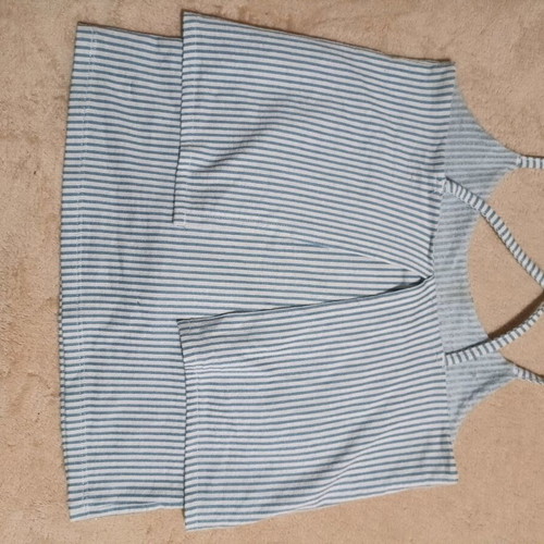 Top used like new xs with white and turquoise stripes, elastic