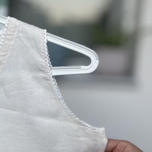 Cream linen blouse with cord and decorative edges