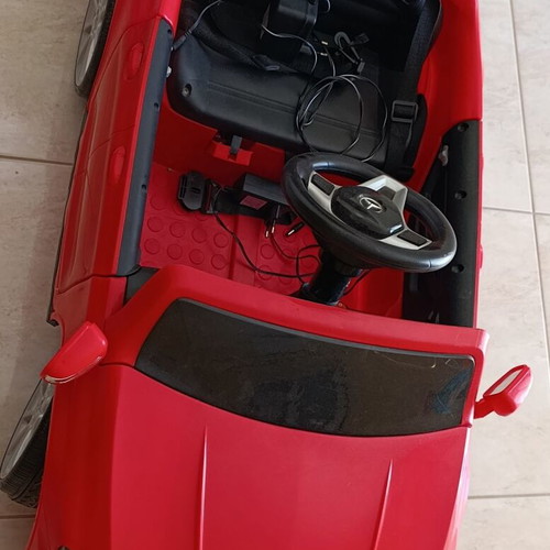 Electric toy car red with charger, like new