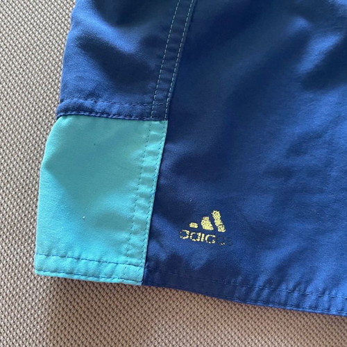 Adidas swimsuit used for 6 years old with mesh lining