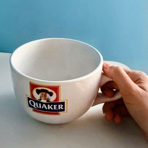 Quaker collectible bowl like new, white ceramic with logo