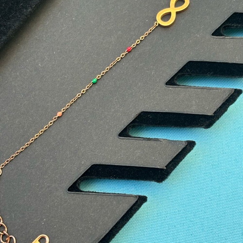 Bracelet with infinity symbol and colorful stones stainless steel like new
