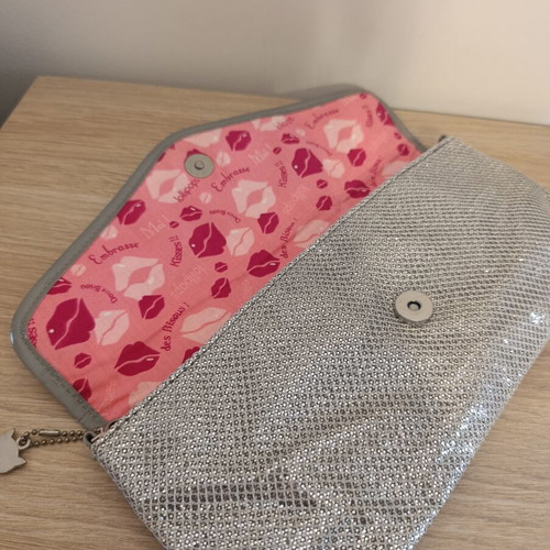 Lollipops bag silver color with decorative wings, like new