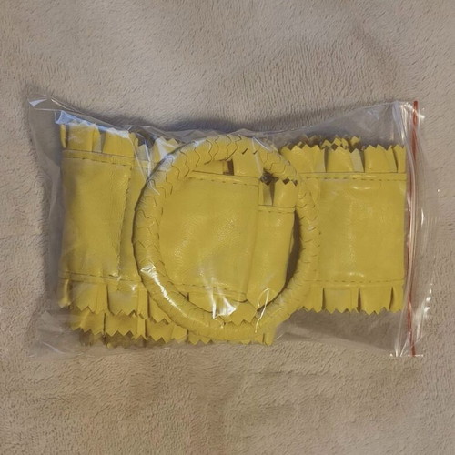 Wide belt with ring in soft yellow, like new
