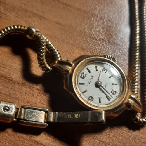 Two vintage wind-up watches and one bamboo watch used