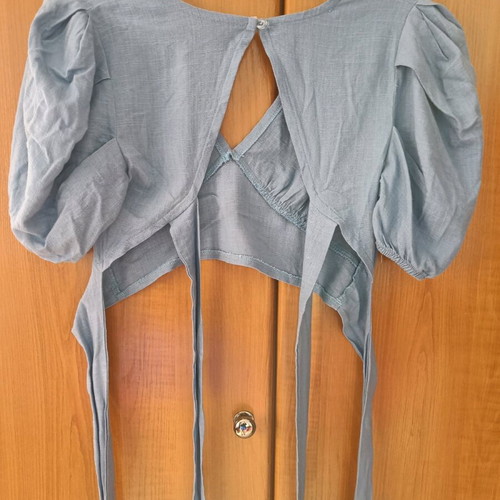 Linen women's blouse like new, blue, back ties