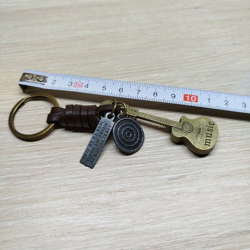 Men's guitar keychain new, brown with gold details