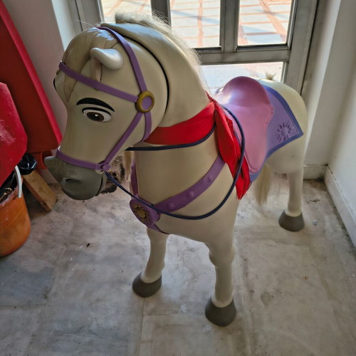 Jakks Pacific Maximus rocking horse toy with sounds used, colorful