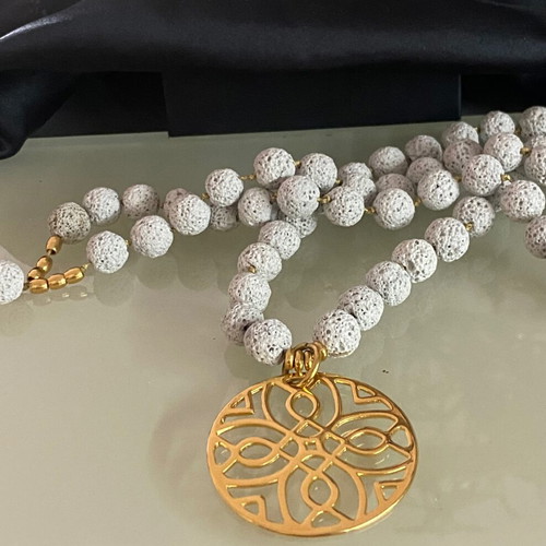 Handmade necklace with lava semi-precious stones and steel motif gray and gold