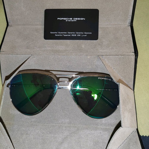 Porsche Design sunglasses used, silver color