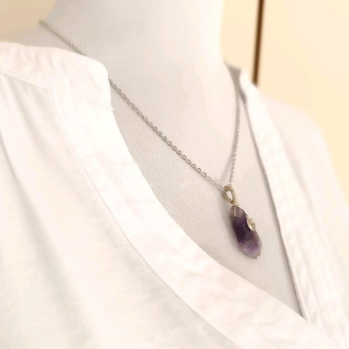 Amethyst wire-wrapped pendant on steel chain