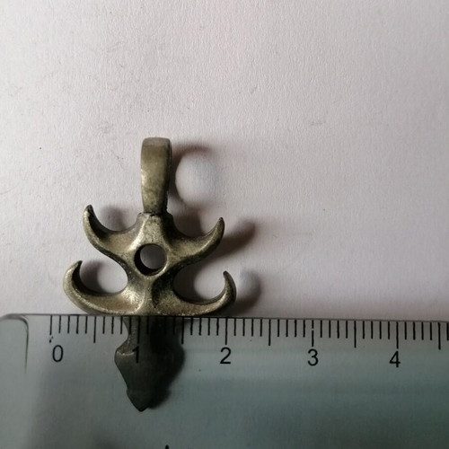 Metal Fishbone Pendant new with tribal designs