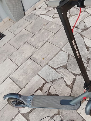 Electric scooter with charger