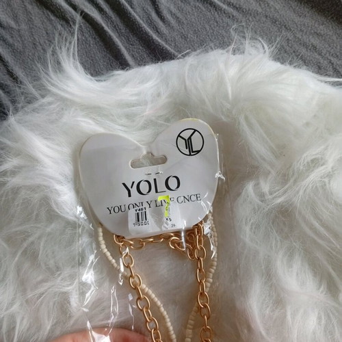 Cross Necklace like new beige