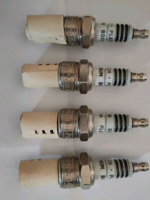Bosch Platinum WR8DPX spark plugs new, 4 pieces for Jeep, Dodge, Chrysler, Ram