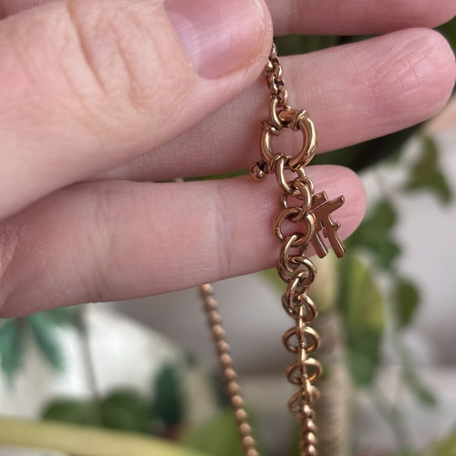 Folli Follie necklace with concentric circles like new, rose gold plated stainless steel