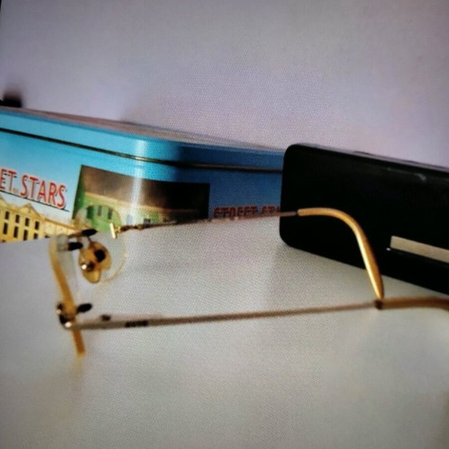 Exte women's eyeglasses like new, gold minimal
