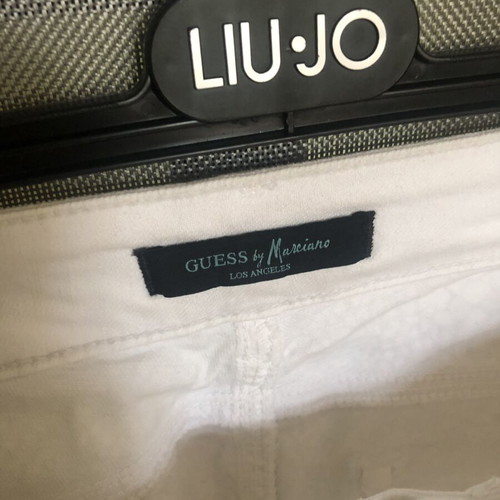 Guess by Marciano women's white jeans with snake print size S like new
