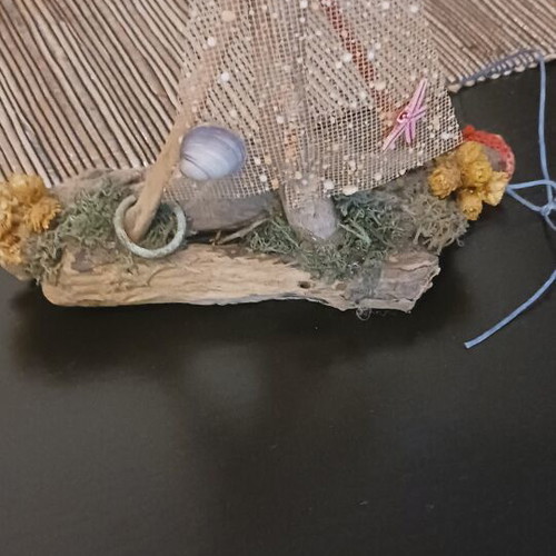 Decorative handmade boat from Kythera with sempre vive flowers
