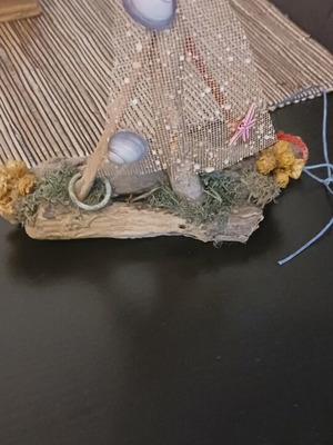Decorative handmade boat from Kythera with sempre vive flowers