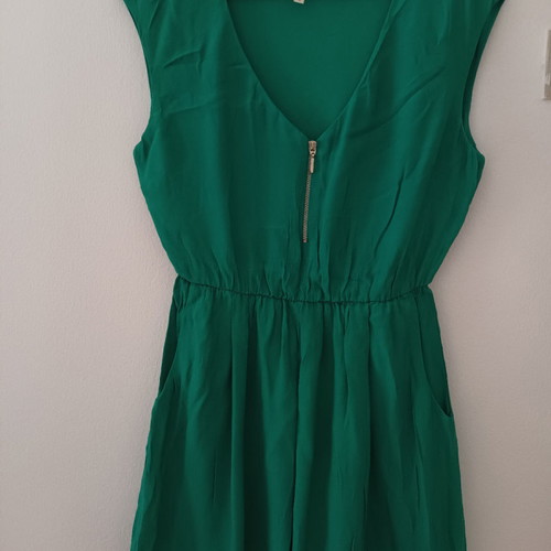 Short green dress with pockets used, size M