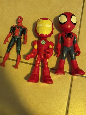 Spider Man and Iron Man figures used with wear