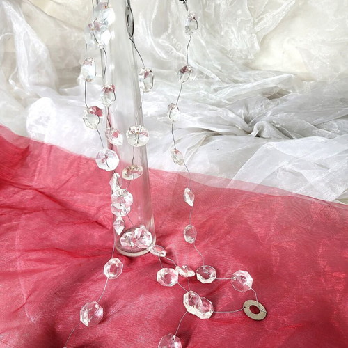 Decorative garland like new with transparent acrylic beads