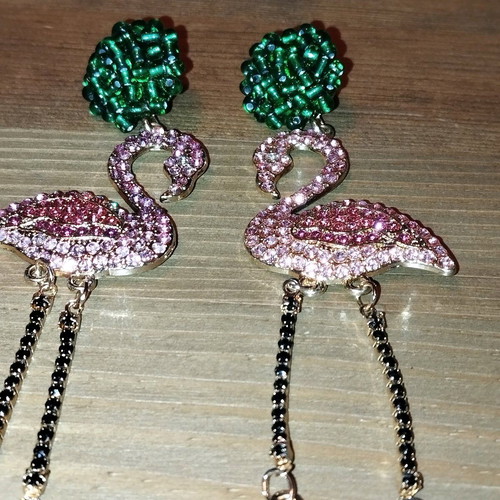Flamingo stud earrings like new, impressive
