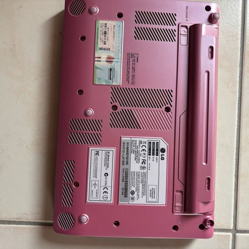 LG laptop like new without charger with pink cover and scratches