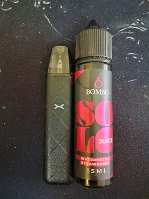 Vaporesso e-cigarette like new with two refill liquids