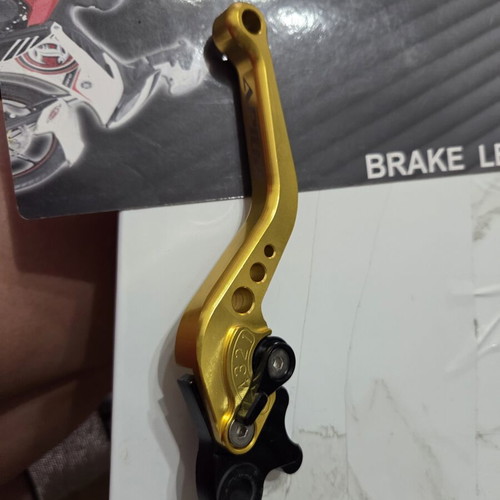 Brake and clutch levers like new, gold and black