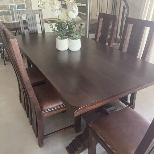 Monastic solid wood dining table with 6 leather chairs and carved coffee table