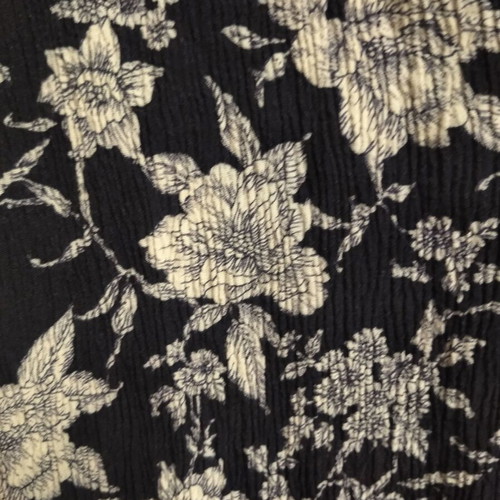 Long sleeveless women's shirt, dark blue with white floral print