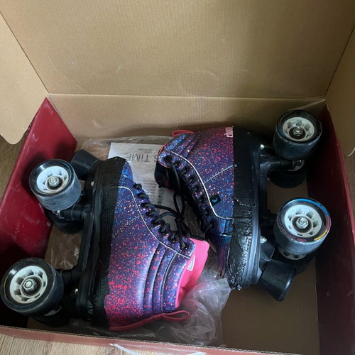 Chaya roller skates used with black tape, suitable for skate park