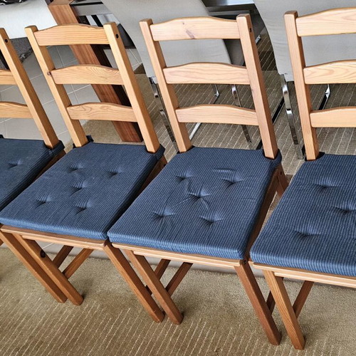 Ikea wooden chairs like new with dark blue cushions, set of four