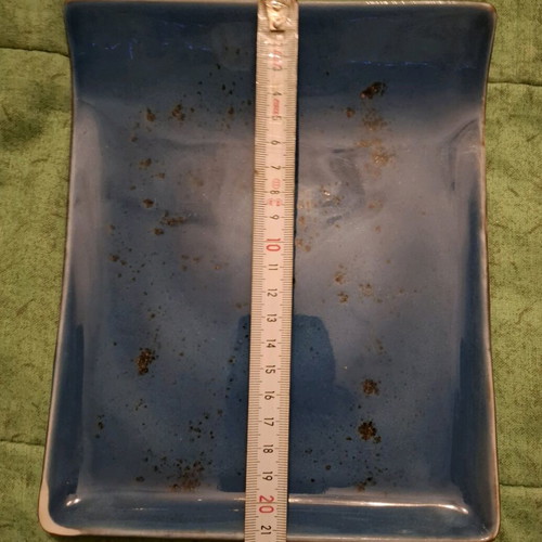 Porcelain plate blue like new with small chip on edge