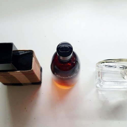 Empty Dior Fahrenheit, Calvin Klein Woman, Burberry London perfume bottles used