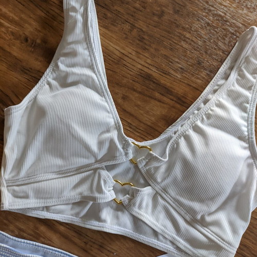 Bikini new, white top with gold heart details and baby blue bottom XS