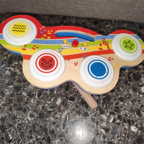 Wooden drum toy with music used