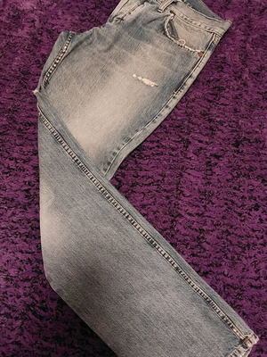 Sisley jeans used, size 32 with tears